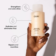 OUAI medium conditioner bottle showcasing nourishing formula for mid-length hair