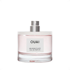OUAI Melrose Place cap closeup highlighting refined packaging and scent