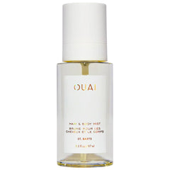 OUAI St. Barts hair and body mist bottle close-up, tropical freshness for hair and skin.