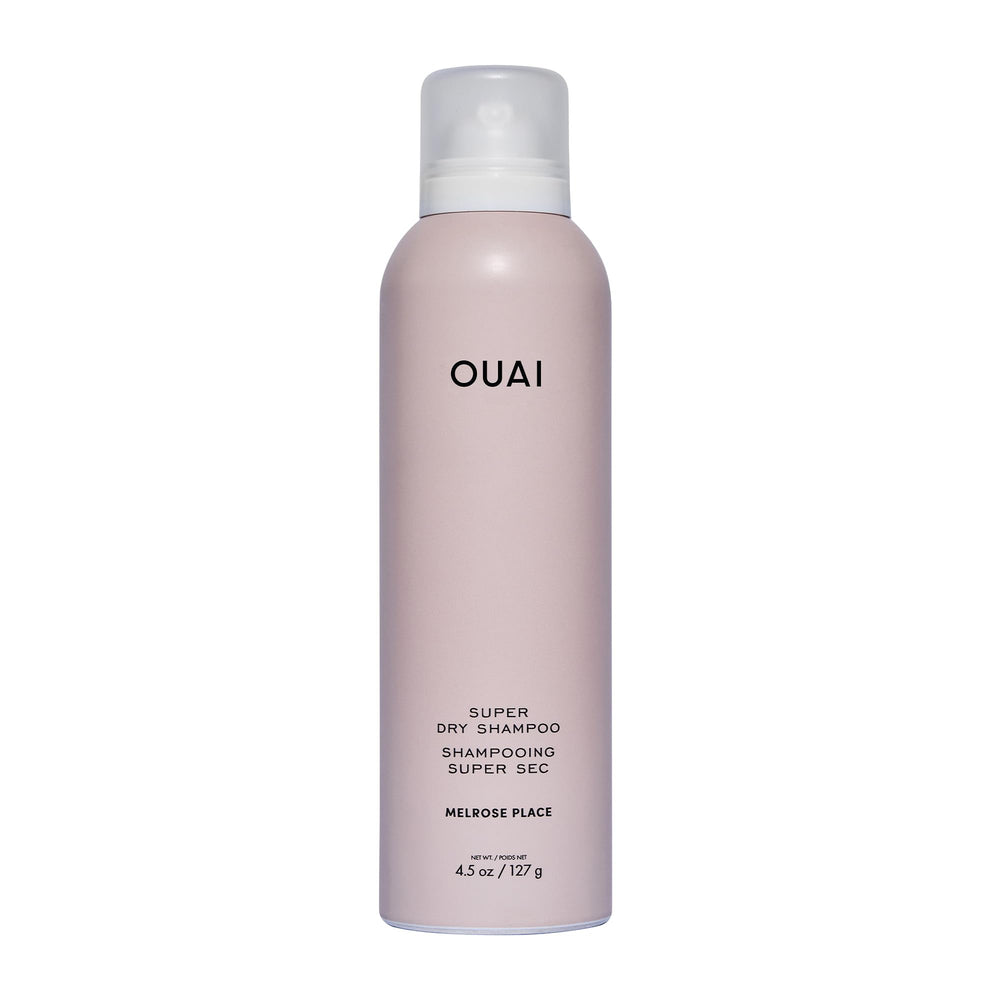 OUAI Super Dry Shampoo bottle demonstrates oil-absorbing formula for quick refresh.