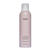OUAI Super Dry Shampoo bottle demonstrates oil-absorbing formula for quick refresh.