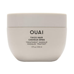 OUAI Thick Hair Mask bottle for smooth, shiny hair.