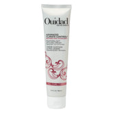 Ouidad Advanced Climate Control bottle pour demonstrates precise application for defined curls.