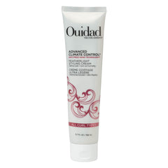 Ouidad Advanced Climate Control bottle pour demonstrates precise application for defined curls.