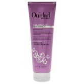 Ouidad Coil Infusion bottle glistening, delivering lightweight hold for defined curls.