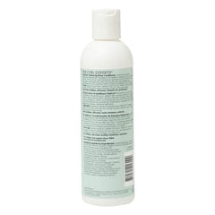 Ouidad VitalCurl+ balance bottle pour captures easy conditioning for detangling.