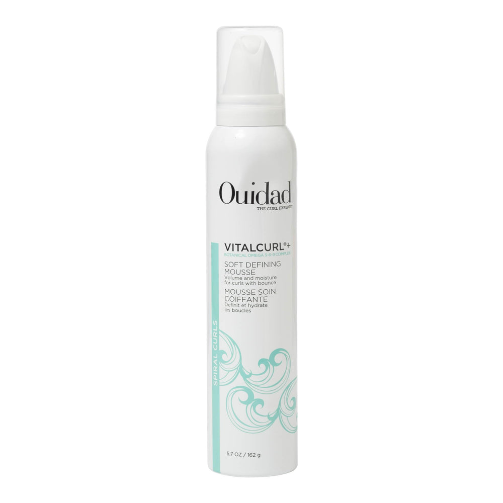 Ouidad VitalCurl+ Mousse bottle for lightweight hold on spiral curls.