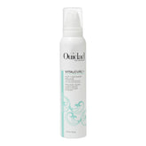 Ouidad VitalCurl+ Mousse bottle for lightweight hold on spiral curls.