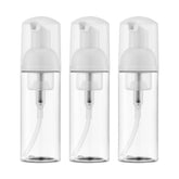 Owlyee 2oz foam pump bottle in clear plastic with cap, ideal for travel hand soap.