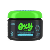 Oxy Deep Pore pad with textured side exfoliating to unclog pores.