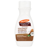 Palmer's loción corporal fórmula aceite de coco, botella con tapa abatible para hidratación duradera.