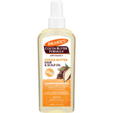 Palmers Aceite de Manteca de cacao y biotina, frasco, hidrata profundamente el cabello.