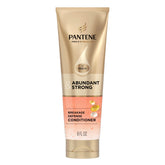Pantene Abundante y Fuerte acondicionador en botella para cuidado diario y cabello más resistente.
