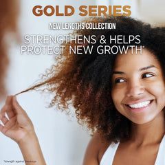 Pantene Gold Series serum applied to damp curls for even distribution