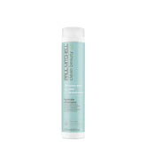 Paul Mitchell Clean Beauty Hydrate Shampoo bottle pour demonstrates hydration for dry hair.