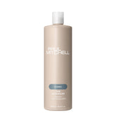 Paul Mitchell The Detangler botella cremosa facilita el desenredo y aporta brillo.