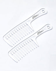 Paul Mitchell Detangler Comb on dry hair for snag-free styling.