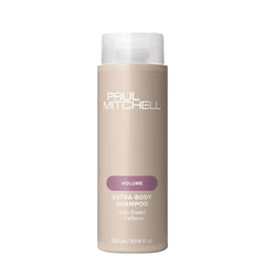 Paul Mitchell Extra-Body Shampoo: botella clara, volumen para cabello fino.