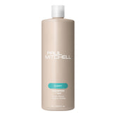 Paul Mitchell Shampoo Two bottle pouring for deep cleansing and buildup removal