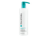 Paul Mitchell Super-Charged Treatment bottle close-up promises deep hydration for dry hair.