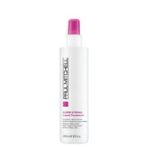 Paul Mitchell Super Strong Liquid Treatment bottle on shelf promising stronger hair.