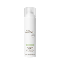 Paul Mitchell Texturizing Spray bottle shows weightless texture and volume.