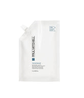 Paul Mitchell The Detangler bottle demonstrating easy detangling and enhanced shine.