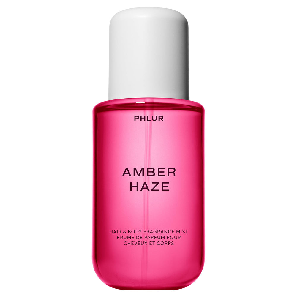 PHLUR Amber Haze bottle close-up highlighting warm amber scent.