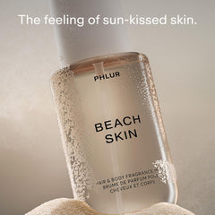 PHLUR Beach Skin Mist being applied to hair for subtle fragrance