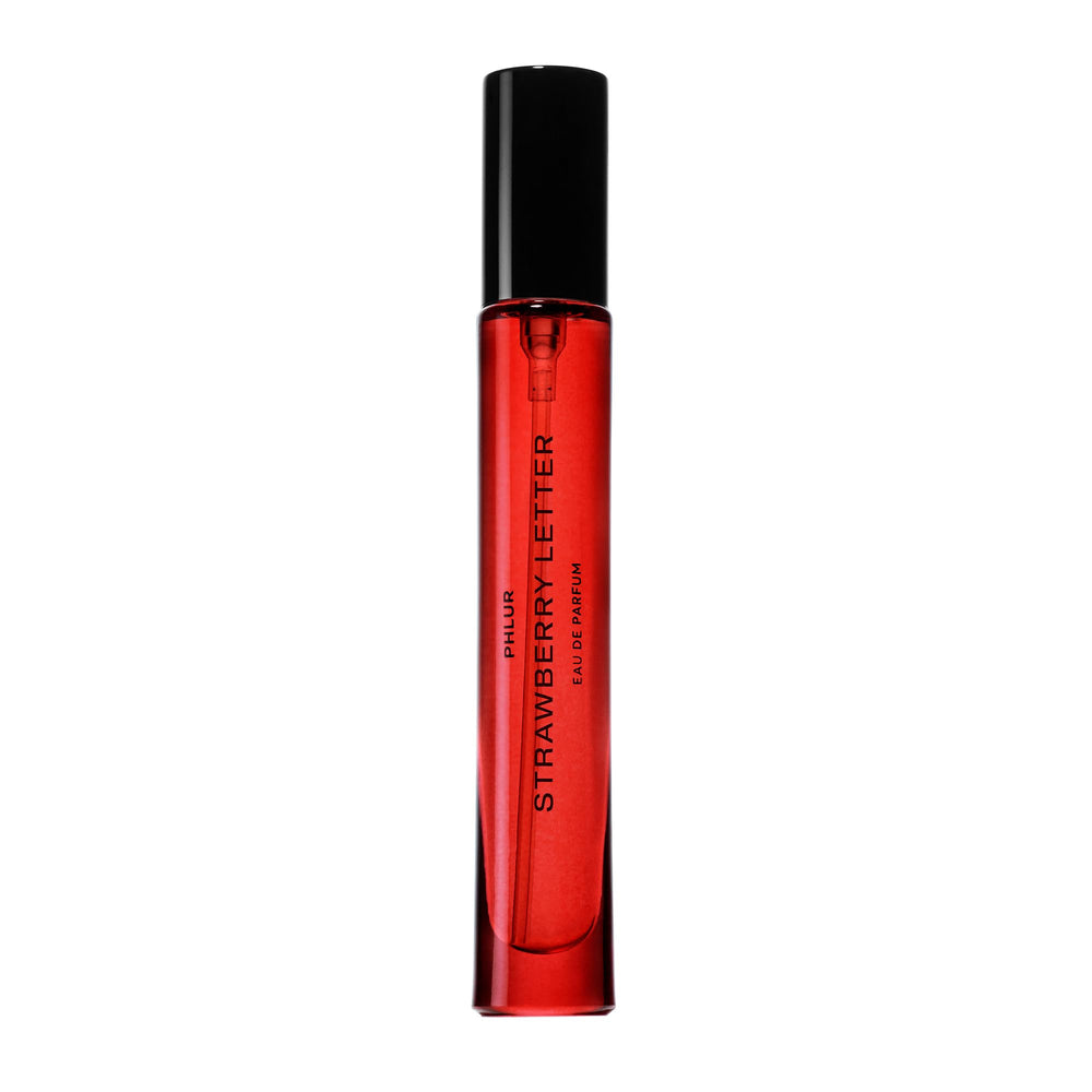 PHLUR Strawberry Letter travel-size bottle for on-the-go fragrance.