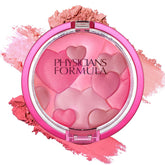 Physicians Formula Happy Booster: polvo de rubor rosado para un brillo natural.