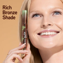 Brocha redonda de Physicians Formula Mascara manteca bronce para cobertura uniforme.