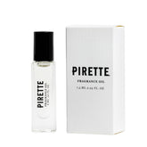 PIRETTE mini fragrance bottle with beach coconut notes for on-the-go freshness.