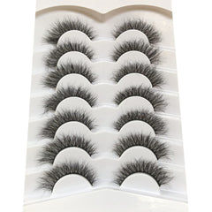 Pooplunch wispy cat-eye lashes add flutter and defined outer corners.