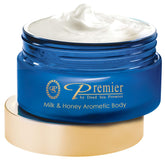 Premier Dead Sea Body Butter bottle close-up, highlighting milk and honey scent for daily hydration.