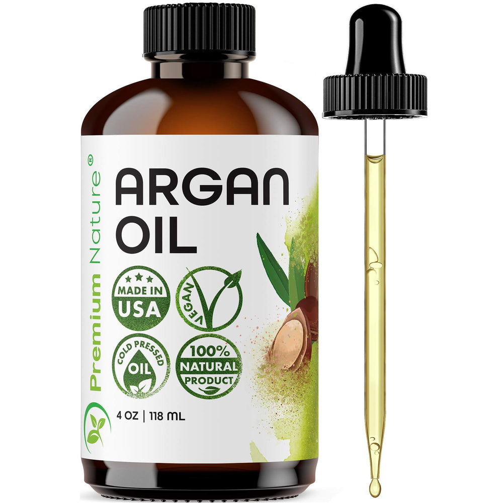 Premium Nature Aceite de Argán en botella, enfoque en empaque para cabello suave