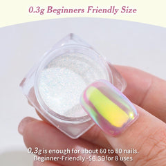 Pretty Diva aurora chrome powder rubbed onto nail for iridescent finish.