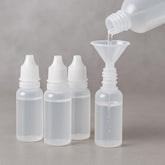Pretwad 5-piece bottle set with funnel for easy refills.