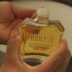 Proraso sandalwood aroma bottle close-up conveys barbershop-quality scent