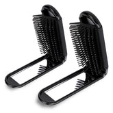 Psyqtsuary foldable hair brush with mirror for travel touch-ups.