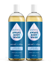 Puracy Awake body wash bottle with citrus sea salt scent for an energizing cleanse.