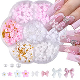 Adorno Qdsuh para uñas con lazo rosa, ideal para un look elegante.