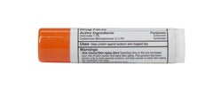 Quantum Health ColdStick SPF21 Tangerine application for on-the-go lip protection.