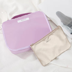 Detachable cosmetic bag feature of Queboom travel makeup bag in purple