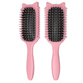 QYuekar curl-defining brush with ergonomic handle for easy detangling.
