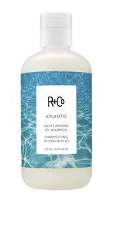 R+Co Atlantis moisturizing shampoo bottle highlights deep conditioning for dry hair