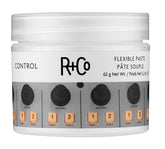 R+Co Control Flexible Paste packaging on vanity for versatile styling options.