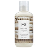 R+Co Ring Tone gel creme bottle showing curl-defining performance and shine
