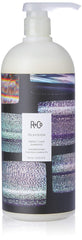 R+Co Television Perfect Hair Shampoo bottle on display highlighting body and shine.