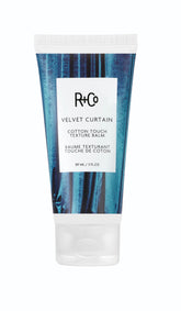 R+Co Velvet Curtain balm texture close-up for smooth, piecey hair.